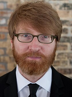 a white man with a red beard